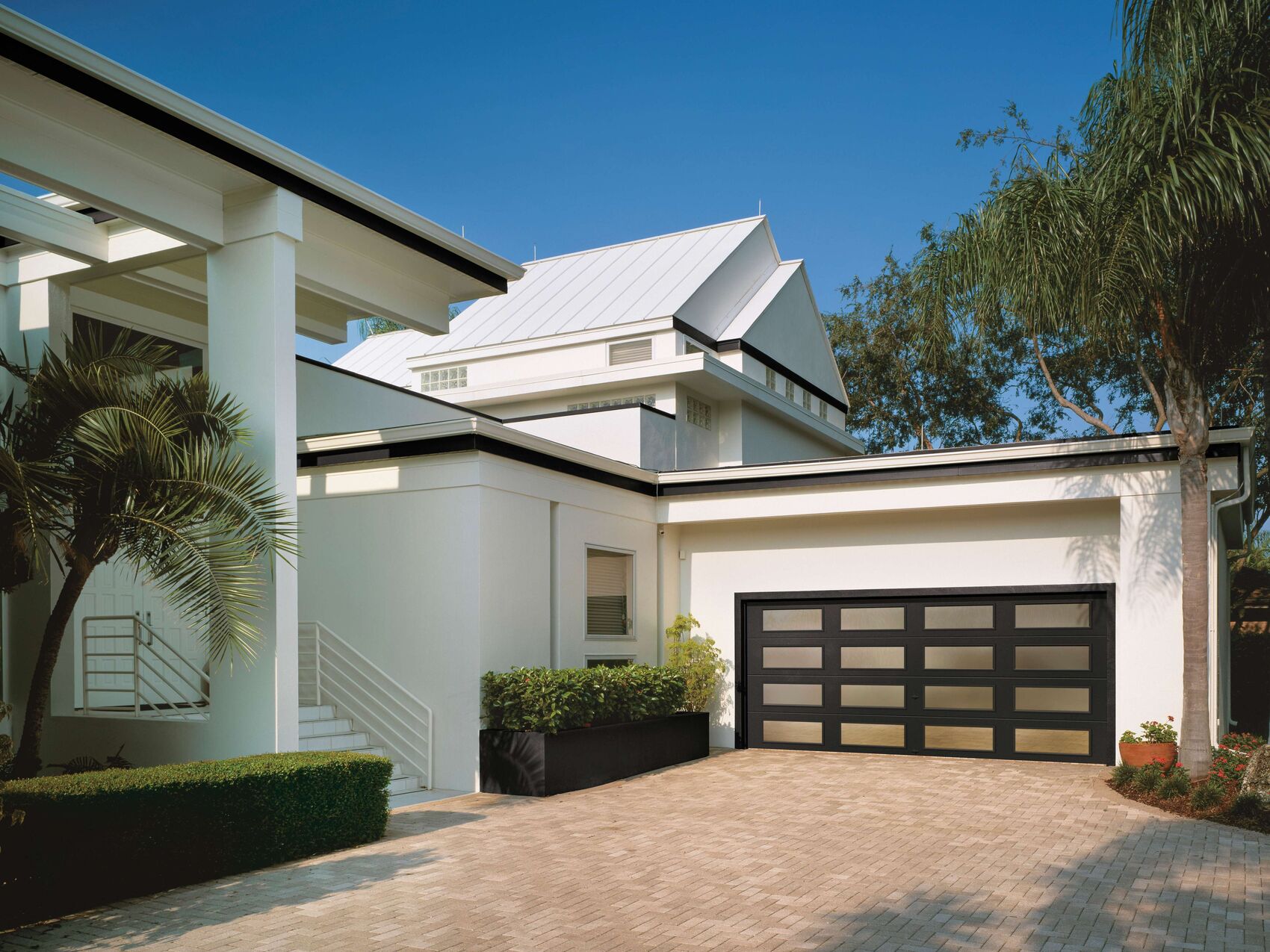 A modern home with a freshly maintained garage door